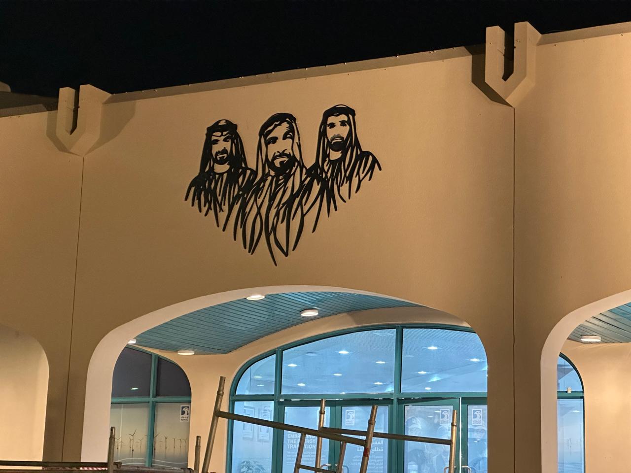 A snowy mountain range with a glacier